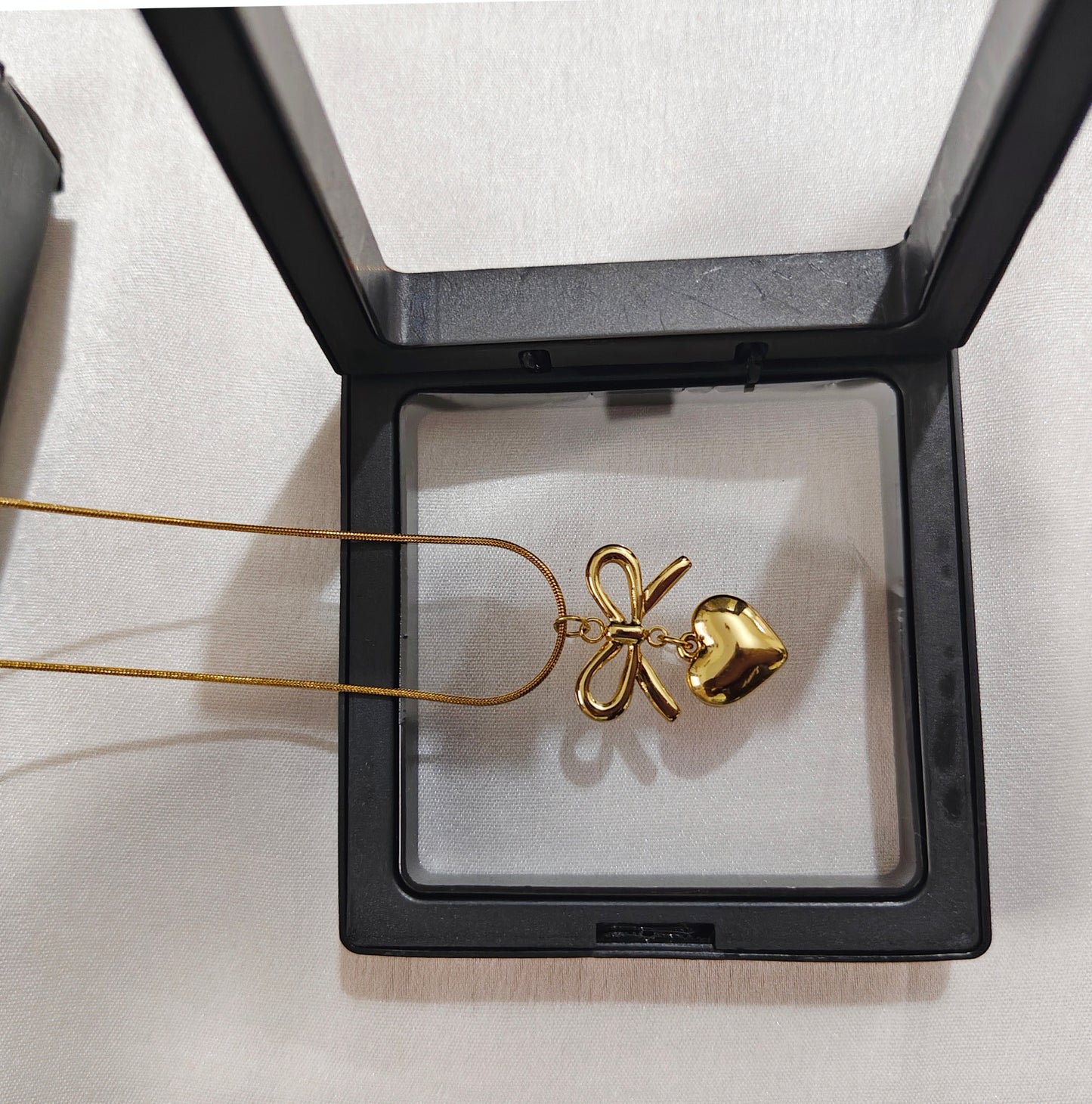 Golden Bow Heart Charm Necklace