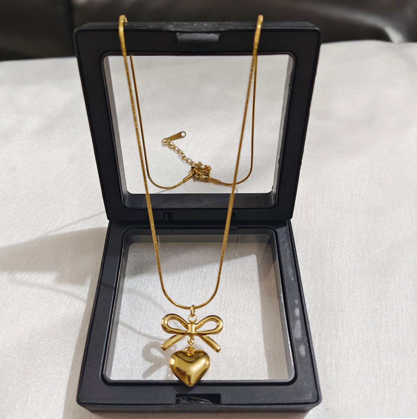 Golden Bow Heart Charm Necklace