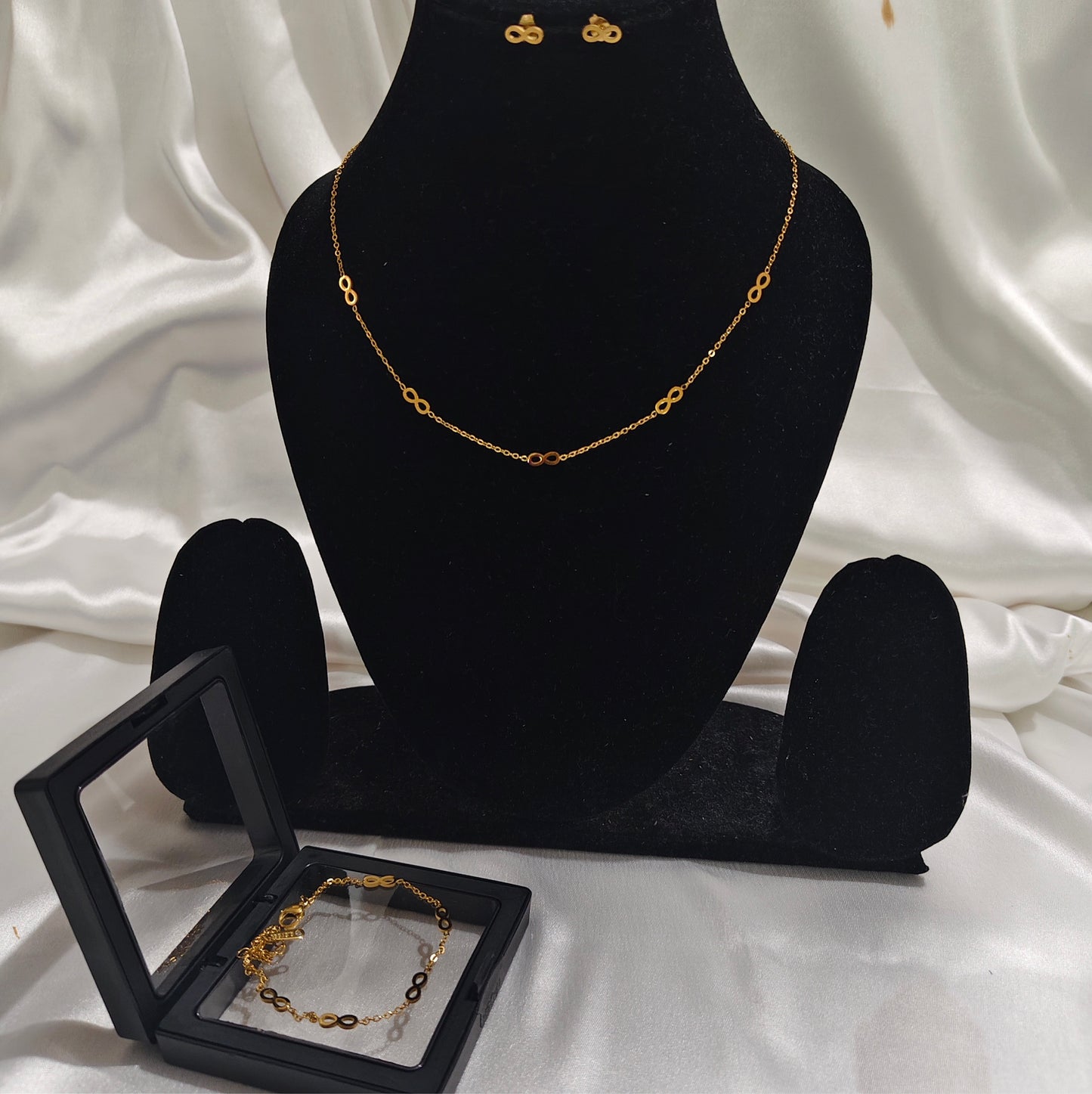 Infinity Elegance Gold-Tone Jewelry Combo (Necklace + Stud Earrings + Bracelet)